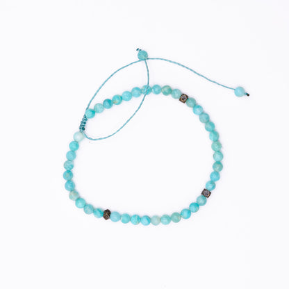 An Amazonite Sliding Knot Anklet laid on a white background. 