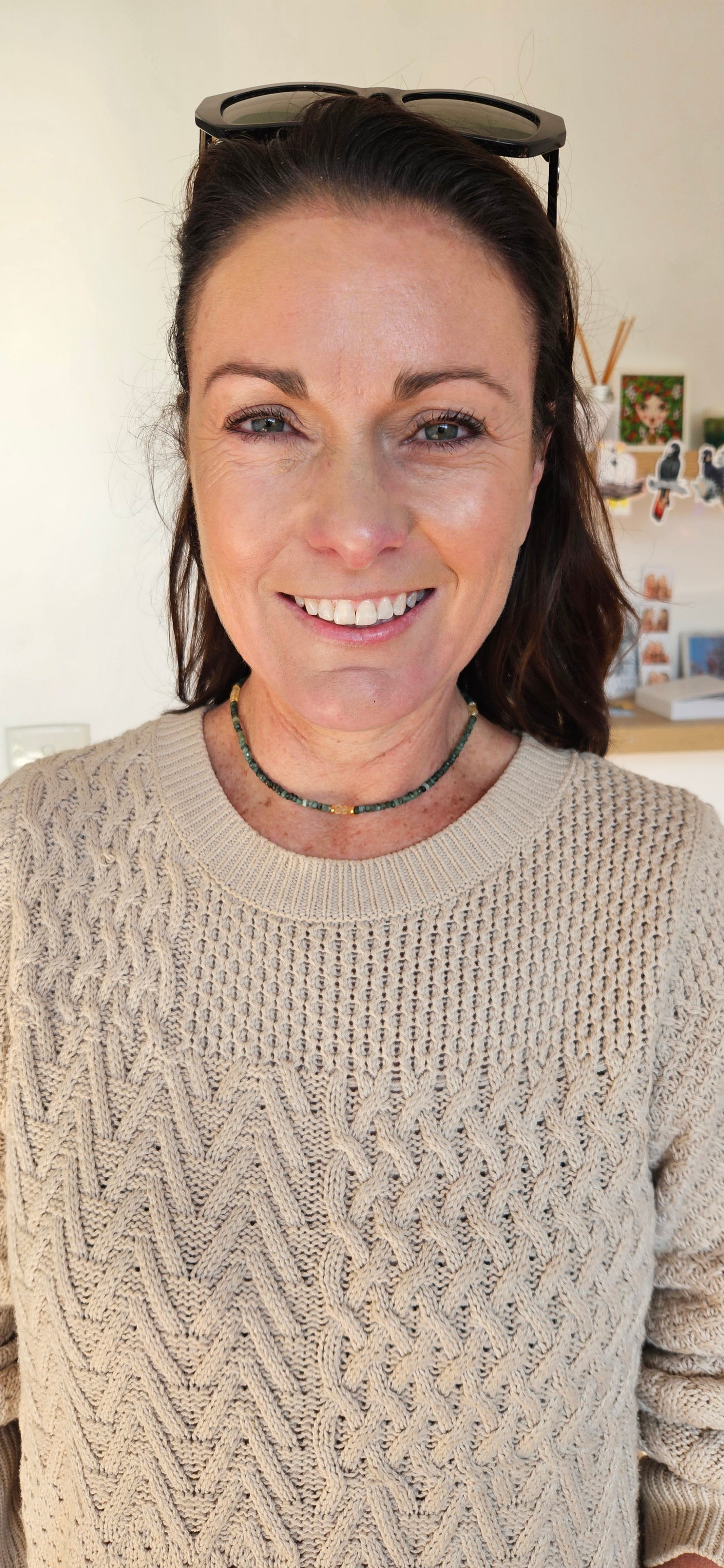 Woman wearing a Soul & Stone necklace.
