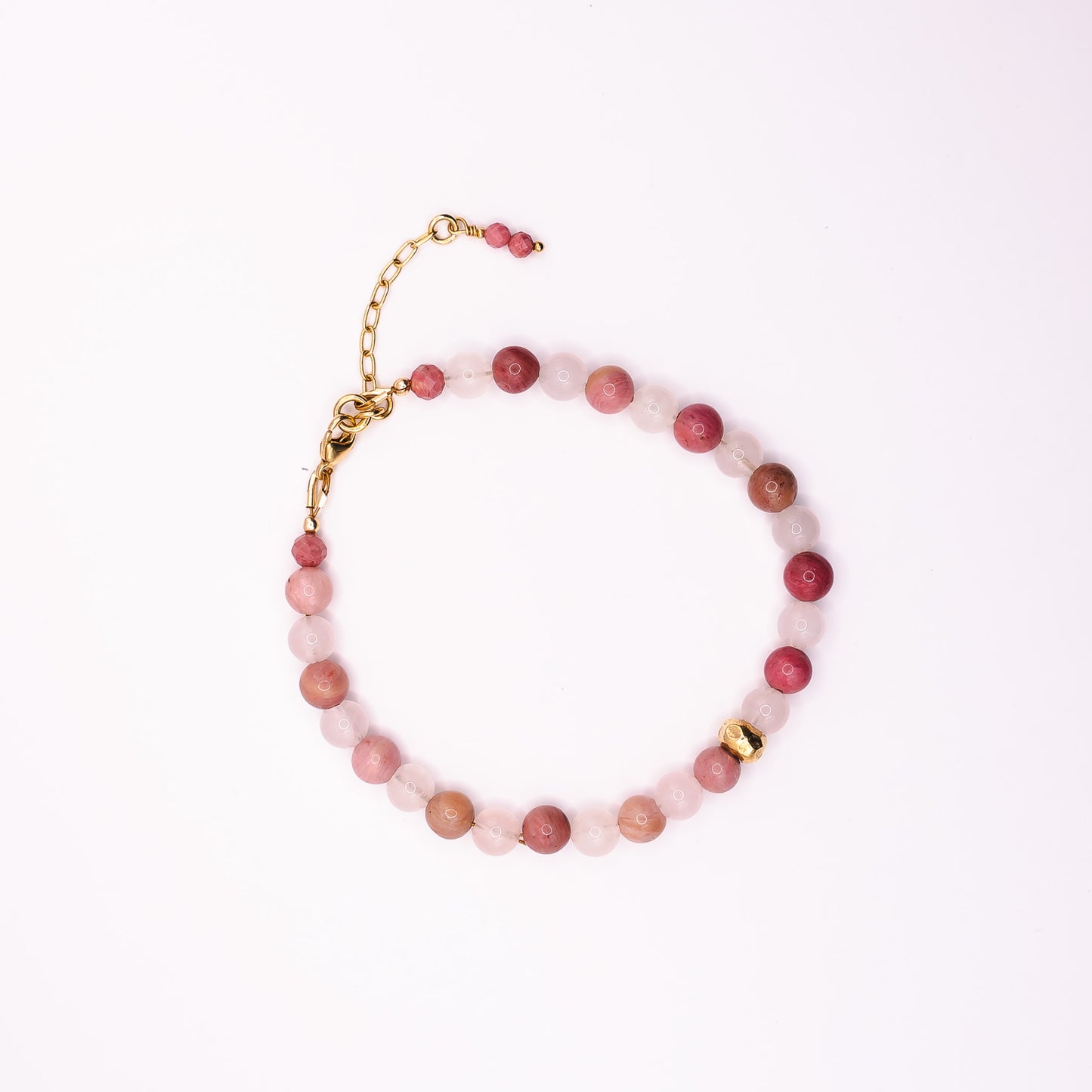 A Soul & Stone hand-knotted gemstone bracelet laid on a white background.